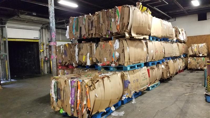 corrugated boxes stashed and bundled together